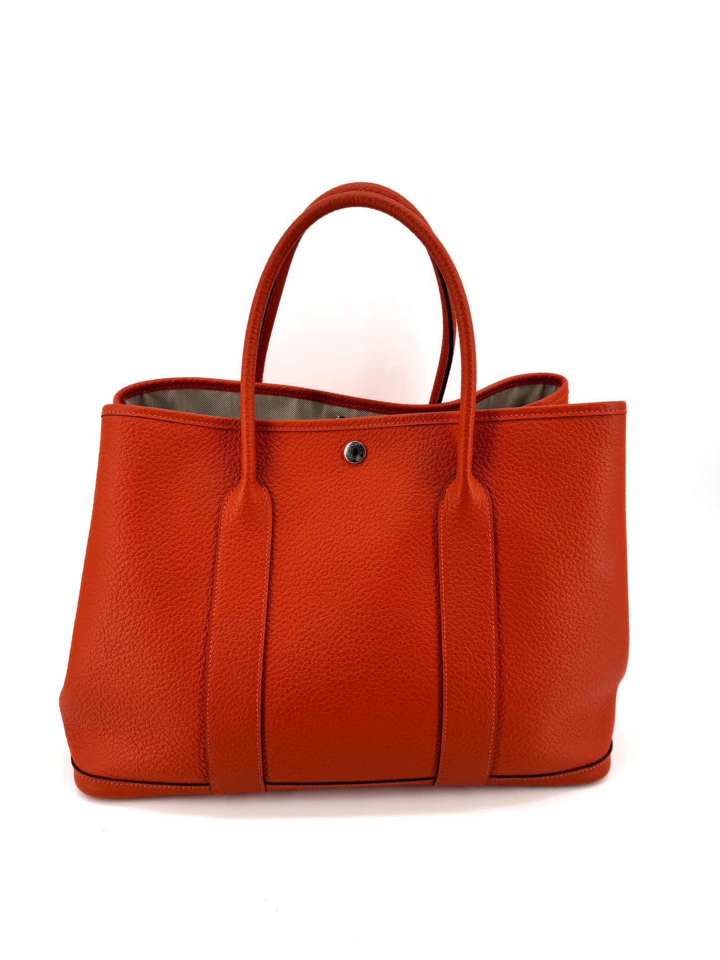 Hermès Garden Party 36 en cuir Clémence orange – L’élégance du cabas iconique au format généreux