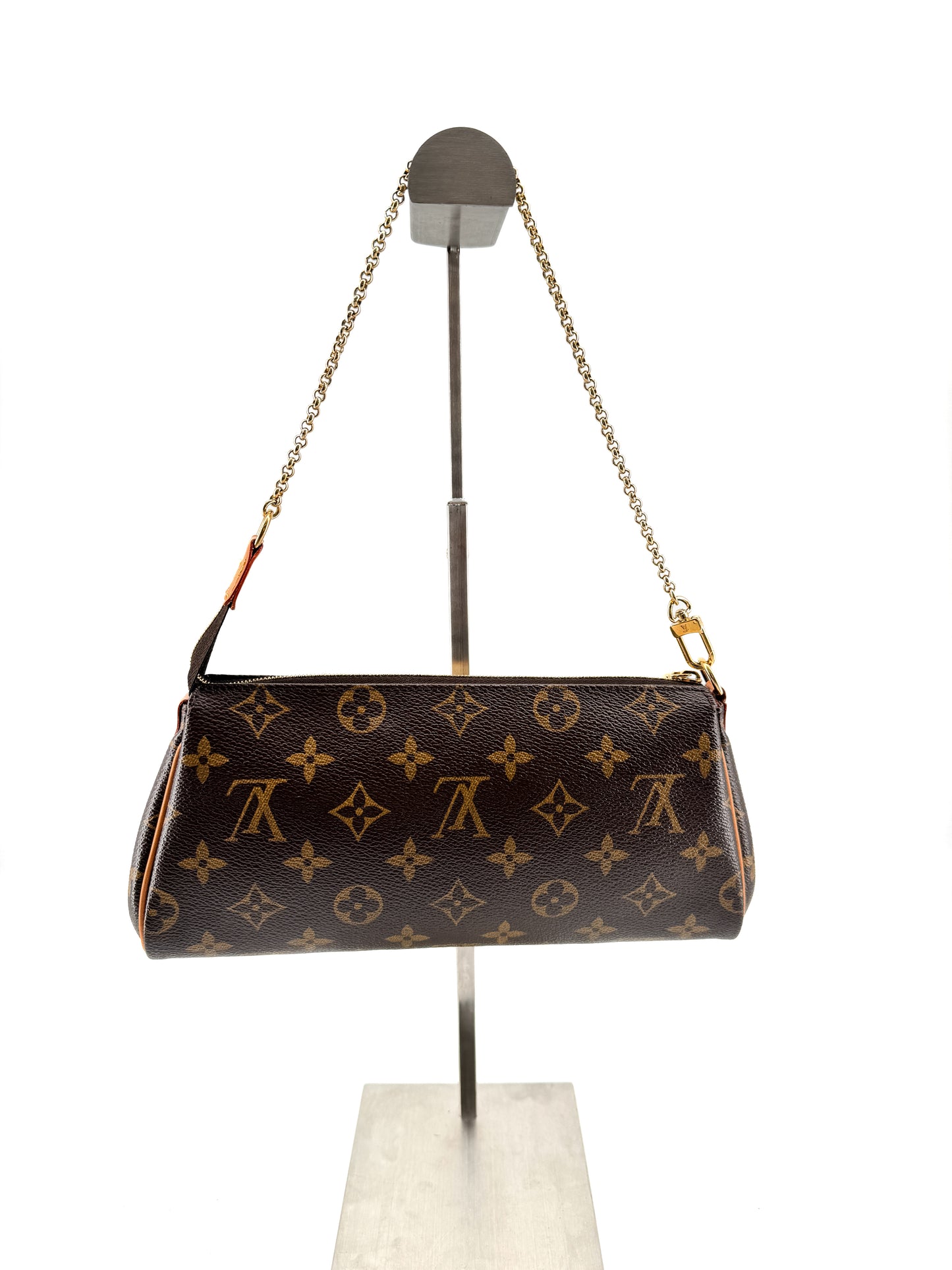 LOUIS VUITTON EVA MONOGRAM – Pochette en toile enduite avec chaîne dorée et bandoulière cuir