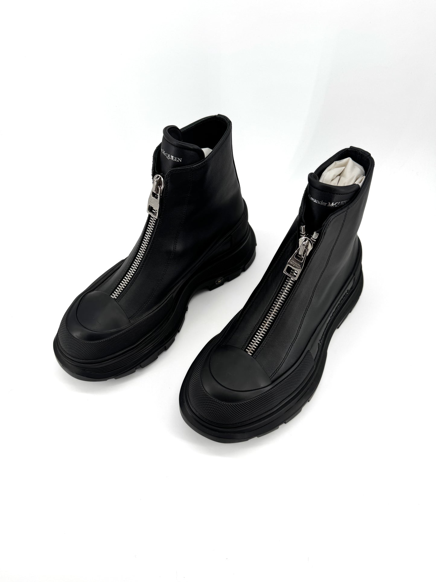 Alexander McQueen Tread Slick Zip Boot – Bottines de luxe en cuir noir, silhouette audacieuse et contemporaine