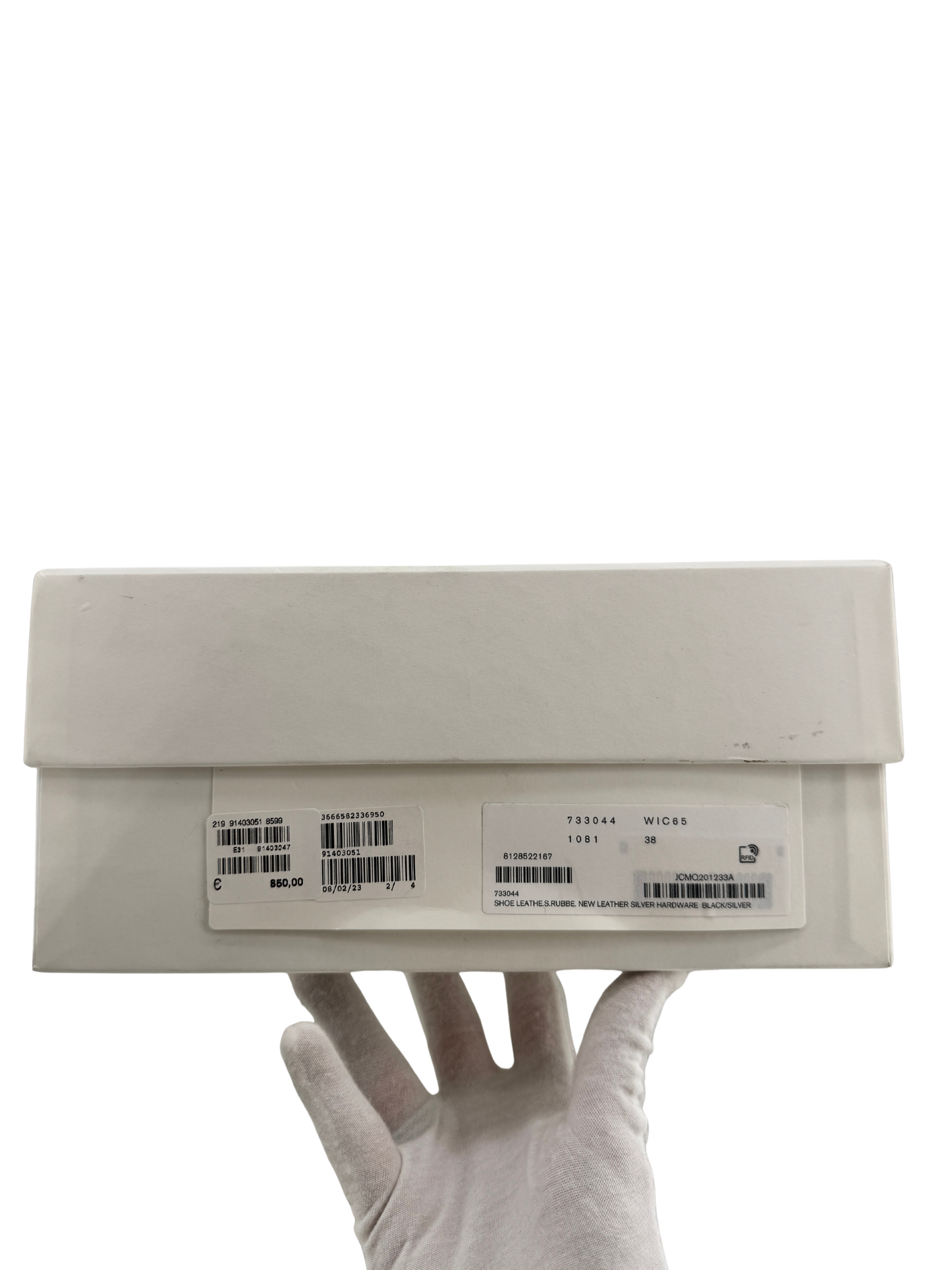 Mocassins Alexander McQueen en cuir noir & œillets argentés — semelle crantée “chunky” (réf. 733044 WIC65, taille 38)