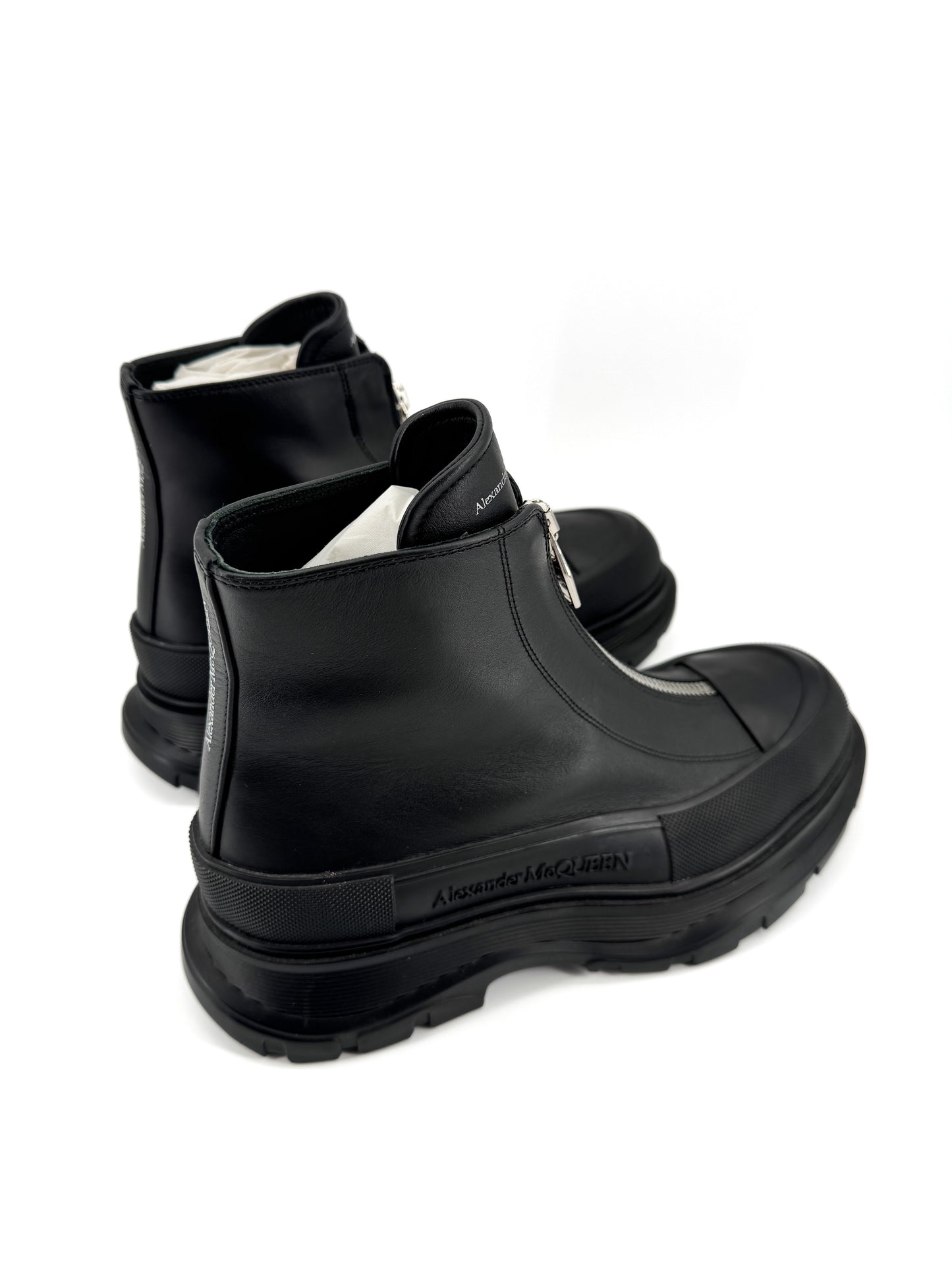 Alexander McQueen Tread Slick Zip Boot – Bottines de luxe en cuir noir, silhouette audacieuse et contemporaine