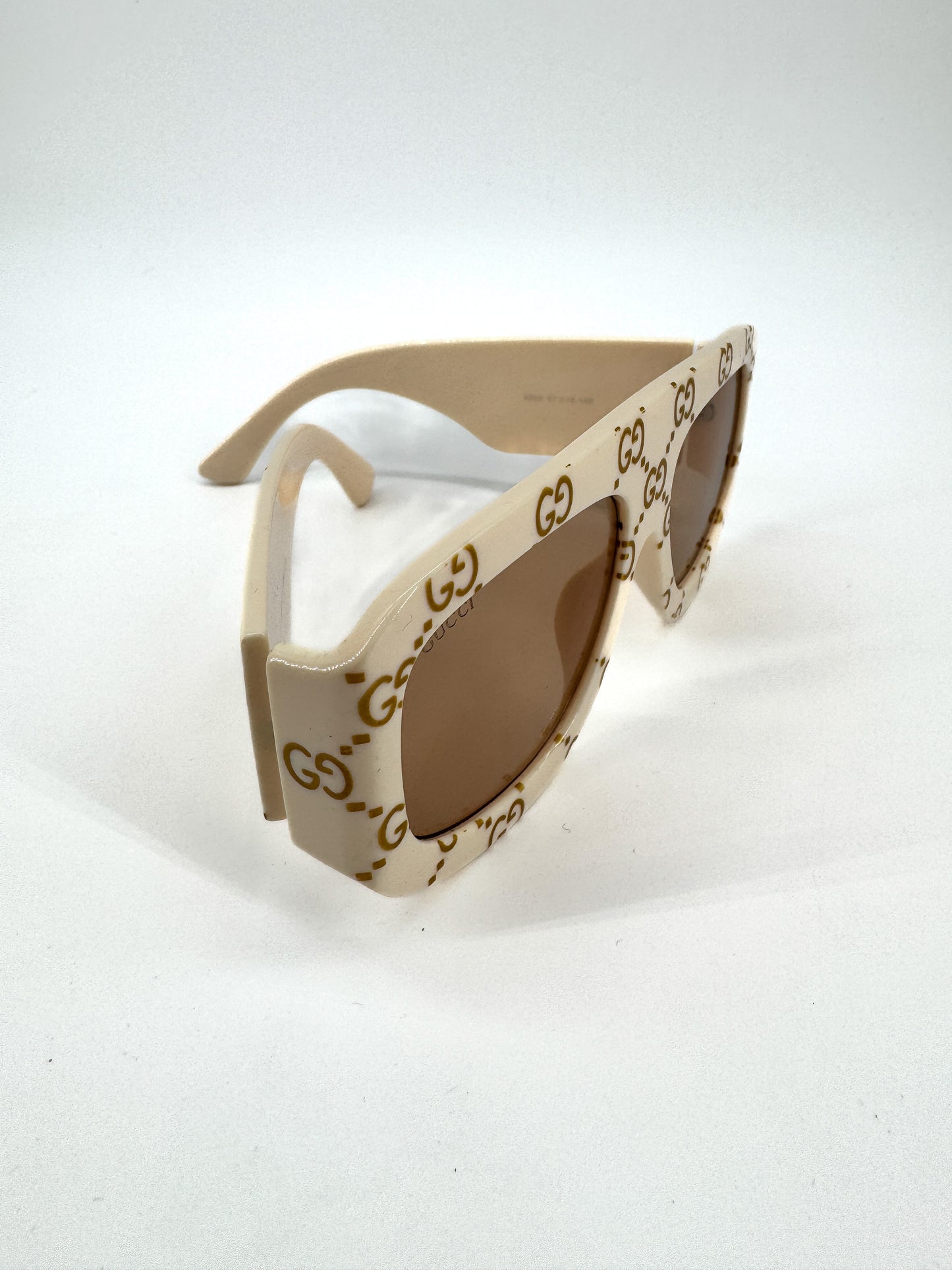 Lunettes de soleil Gucci 6009 – Monture oversize ivoire monogrammée GG