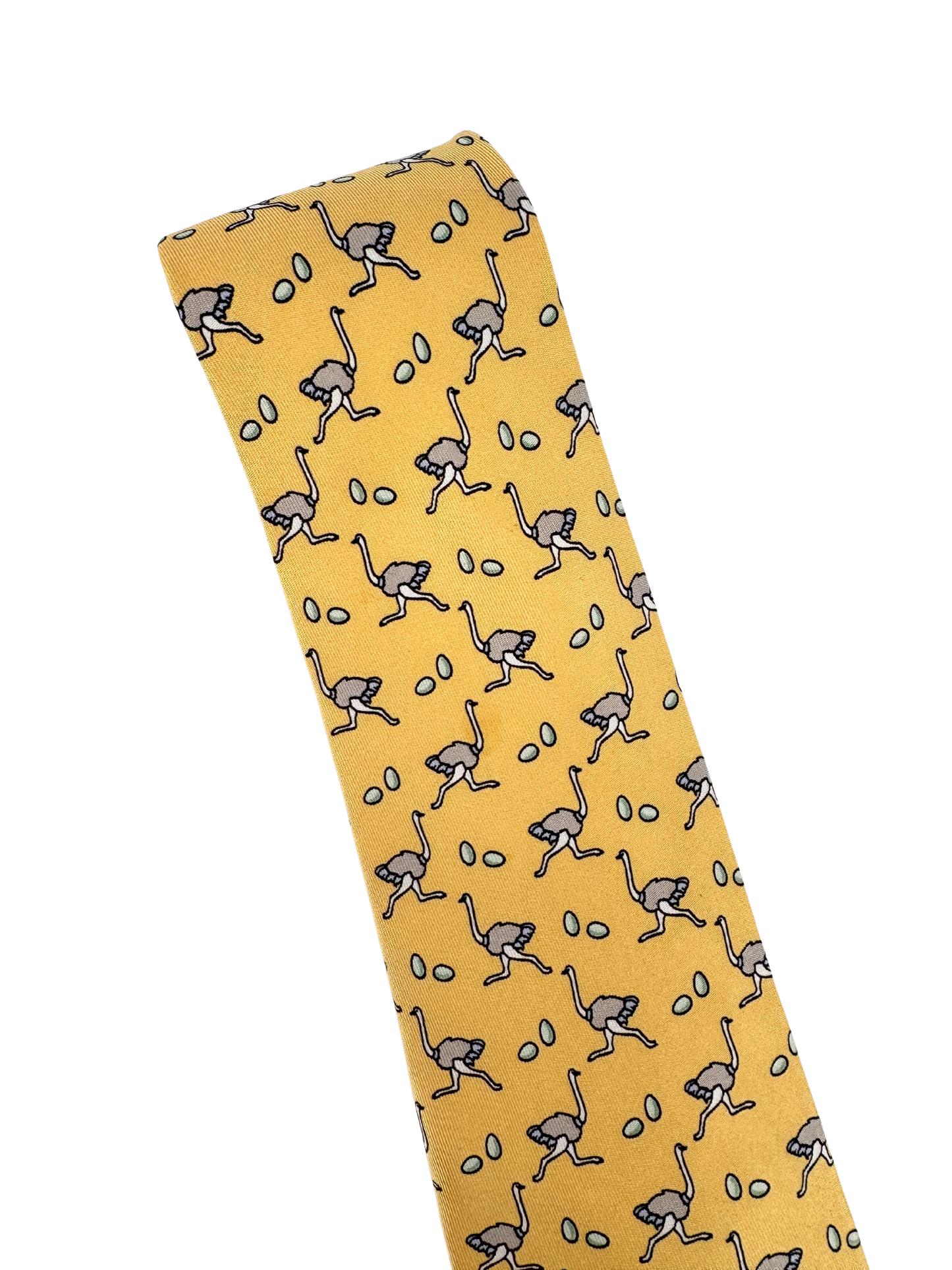 Cravate Hermès en soie Made in France – motif autruches & œufs sur fond jaune