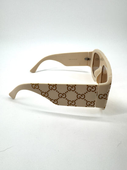 Lunettes de soleil Gucci 6009 – Monture oversize ivoire monogrammée GG