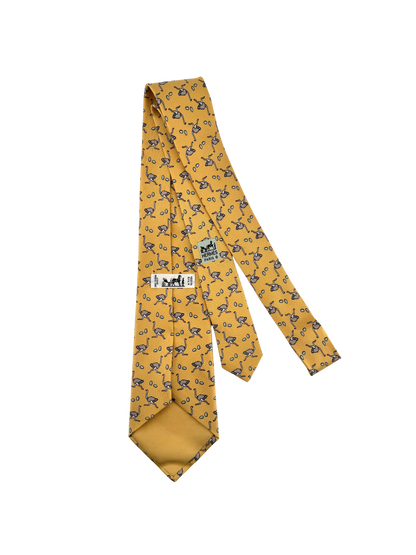 Cravate Hermès en soie Made in France – motif autruches & œufs sur fond jaune